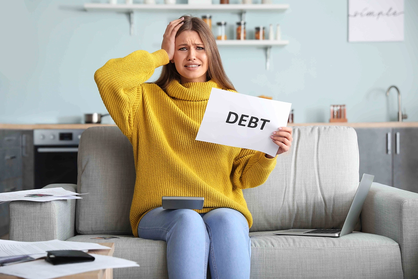 Worried woman in debt